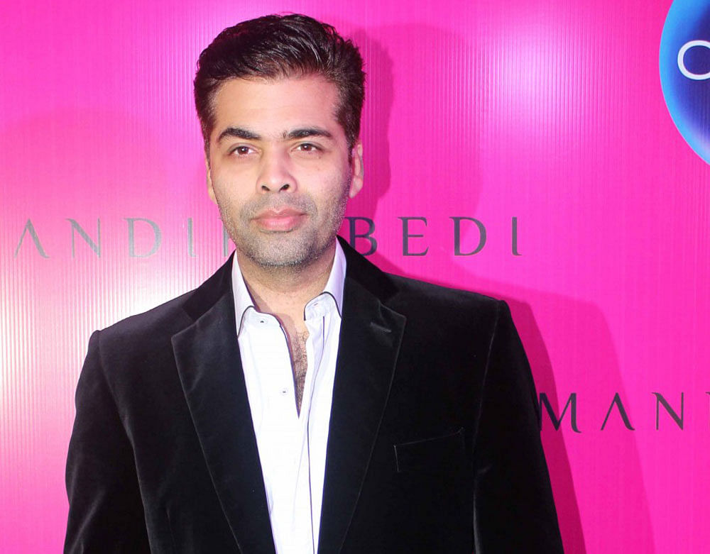 Bollywood celebrities like Karan Johar and Tusshar Kapoor became proud fathers via surrogacy but other aspiring singles may face roadblocks as a proposed law restricts this method by allowing only legally wedded couples. File photo
