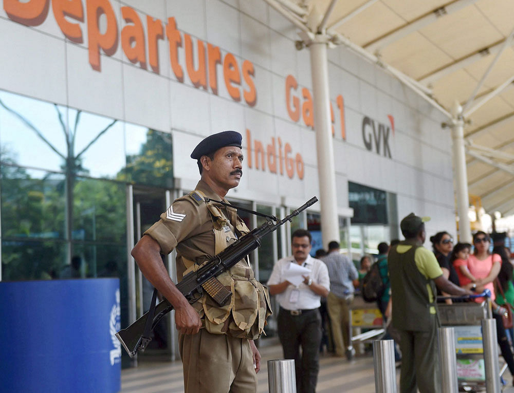 Security personnel stands guard at Mumbai airport following a hijack alert on Sunday. PTI