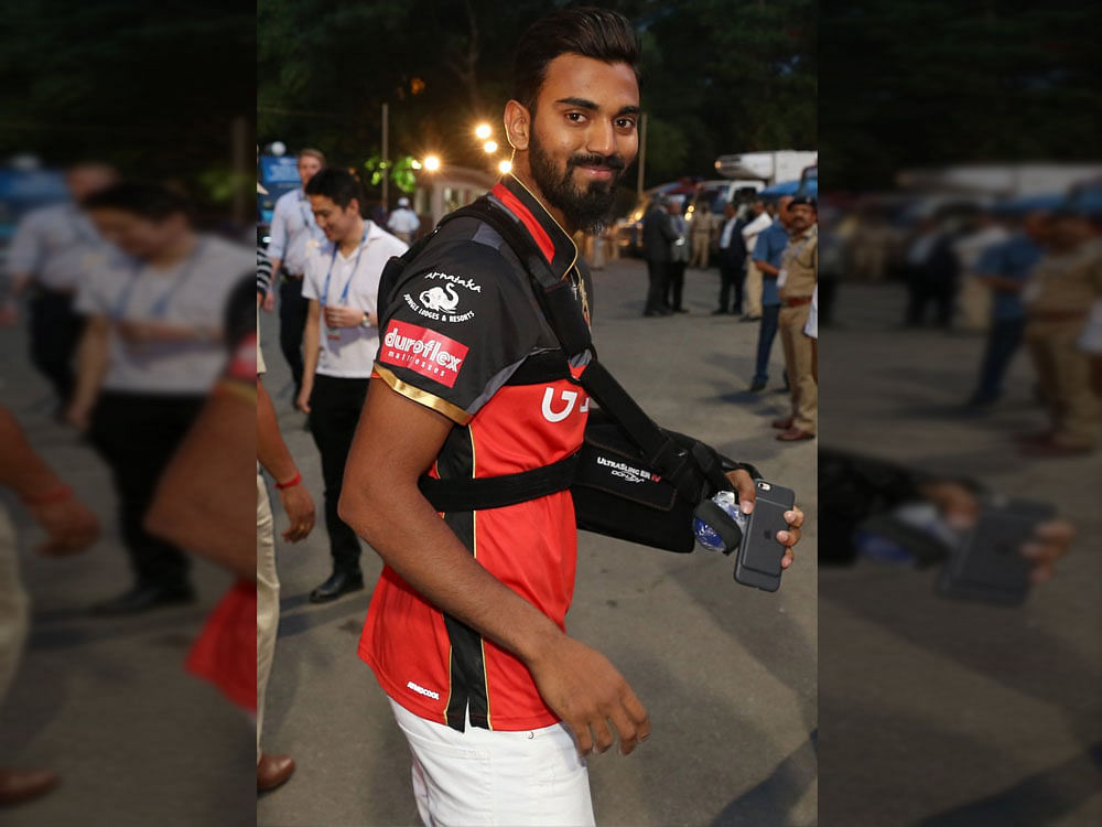 The right-hander, with his operated shoulder in a sling, came to watch the IPL match between RCB and Pune Supergiant at the M Chinnaswamy Stadium on Sunday.