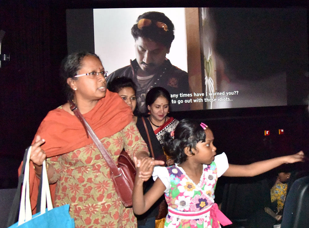 Reality on reel: ATM attack victim Jyothi Uday, producer Nandini Madesh and  Rama Kumar who played Jyothi's role on screen during the screening of the film  'Shuddhi' at ETA Cinepolis in the city on Wednesday. DH Photo