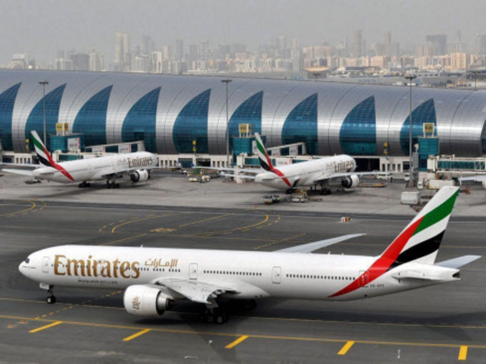 Emirates trims US flights after Trump administration curbs. Photo by Reuters.