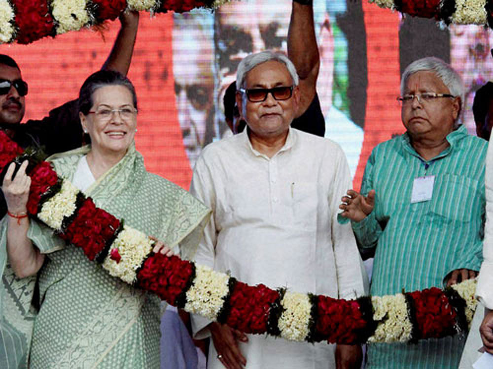 Congress President Sonia Gandhi, Bihar Chief Minister Nitish Kumar and RJD Chief Lalu Prasad Yadav during 'Grand Alliance' election campaign in 2015. Press Trust of India file photo