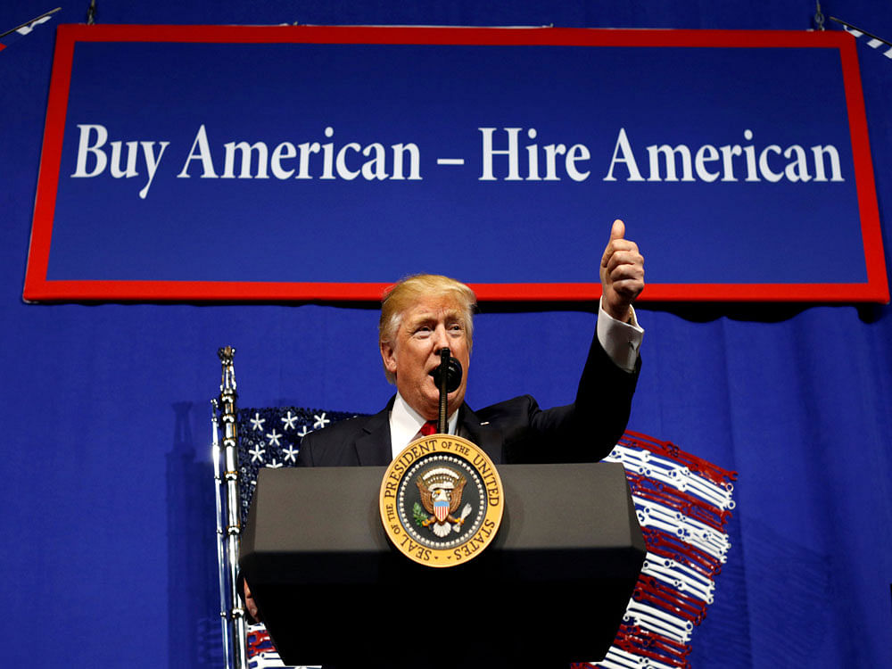U.S. President Donald Trump speaks before signing an executive order directing federal agencies to recommend changes to a temporary visa program used to bring foreign workers to the United States to fill high-skilled jobs during a visit to the world headquarters of Snap-On Inc, a tool manufacturer, in Kenosha, Wisconsin, U.S.,. REUTERS file photo