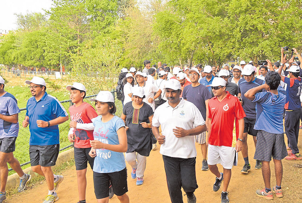 Residents take part in 'Run4Lake-5k' to raise awareness about the dying Vibhutipura lake on Sunday.