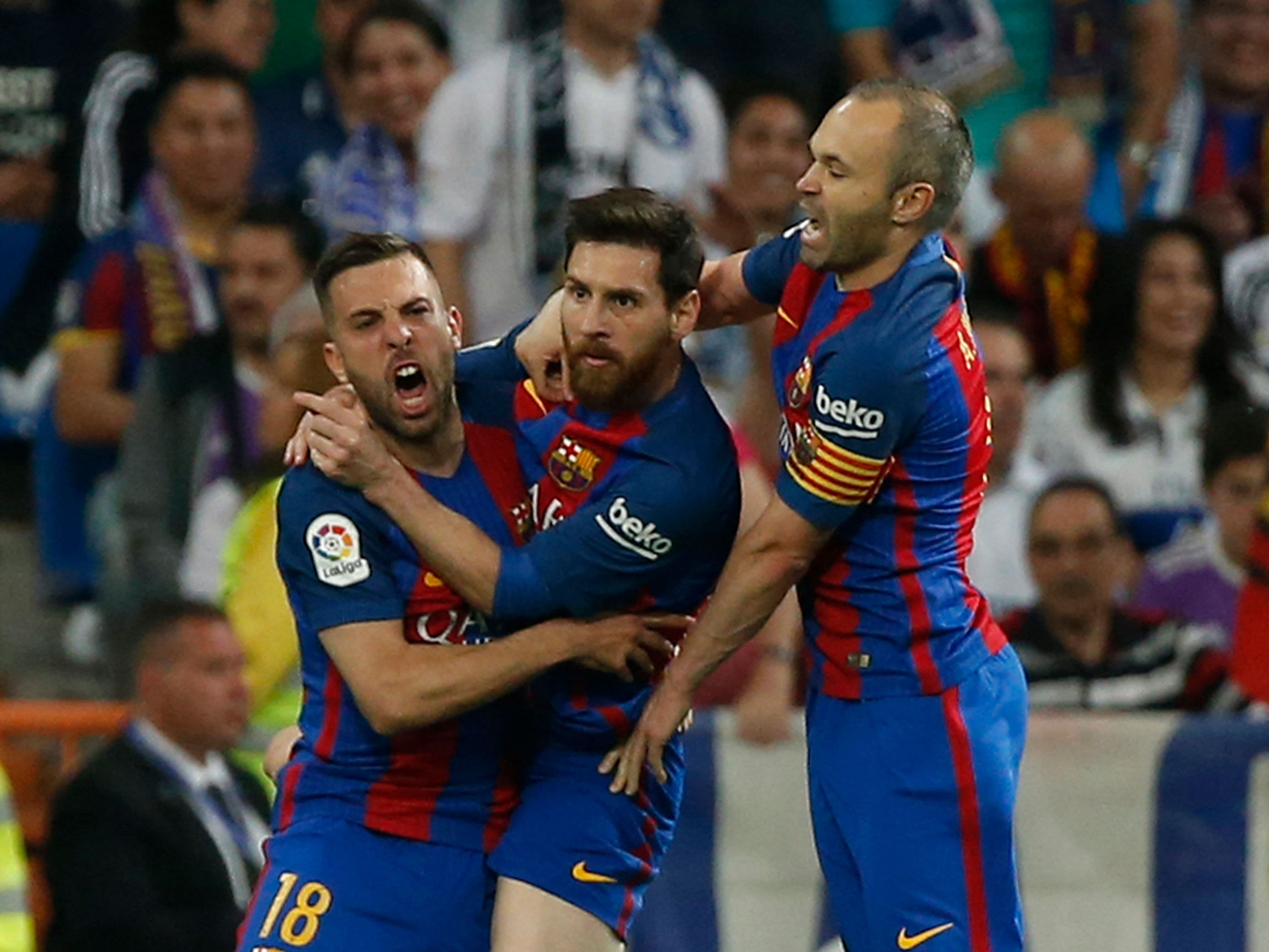 Barcelona's Lionel Messi celebrates scoring their first goal with team mates. Reuters