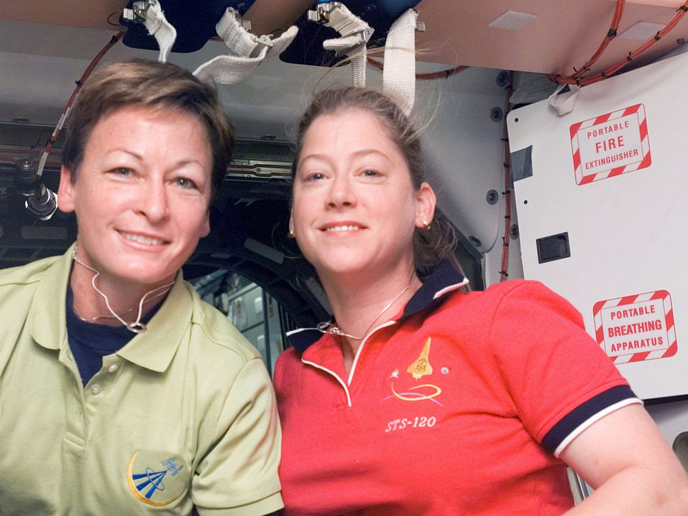 International Space Station Commander and Space Shuttle Discovery Commander in the unity Node of the space station. Picture Credit: DH File Photo