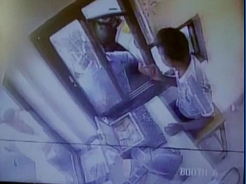Photo taken from the CCTV recording Ambarish's co-passengers riled up at the question of paying toll.