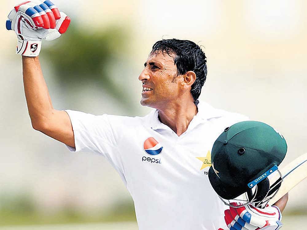 Landmark Pakistani batsman Younis Khan reacts after reaching the 10,000-run landmark on Sunday. AFP