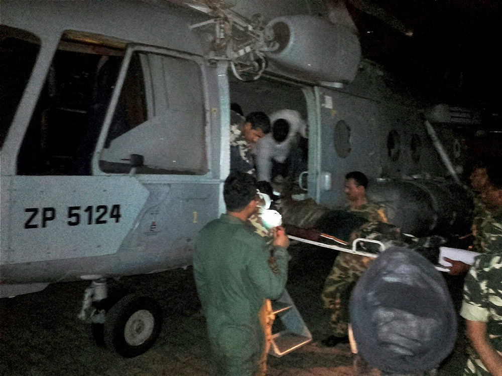 Injured CRPF jawans being airlifted to Raipur by an IAF chopper for treatment on Monday follwing a Maoist attack in Sukma district. PTI Photo