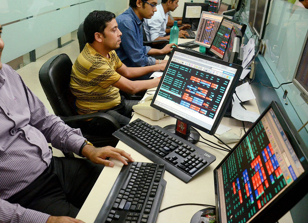The benchmark Sensex scaled the 30,000-mount for the first time to close at 30,133.35, taking the BSE market capitalisation to a record Rs 124.83 trillion. The broader Nifty also continued its rally, scaling a new peak of 9,351.85. PTI photo
