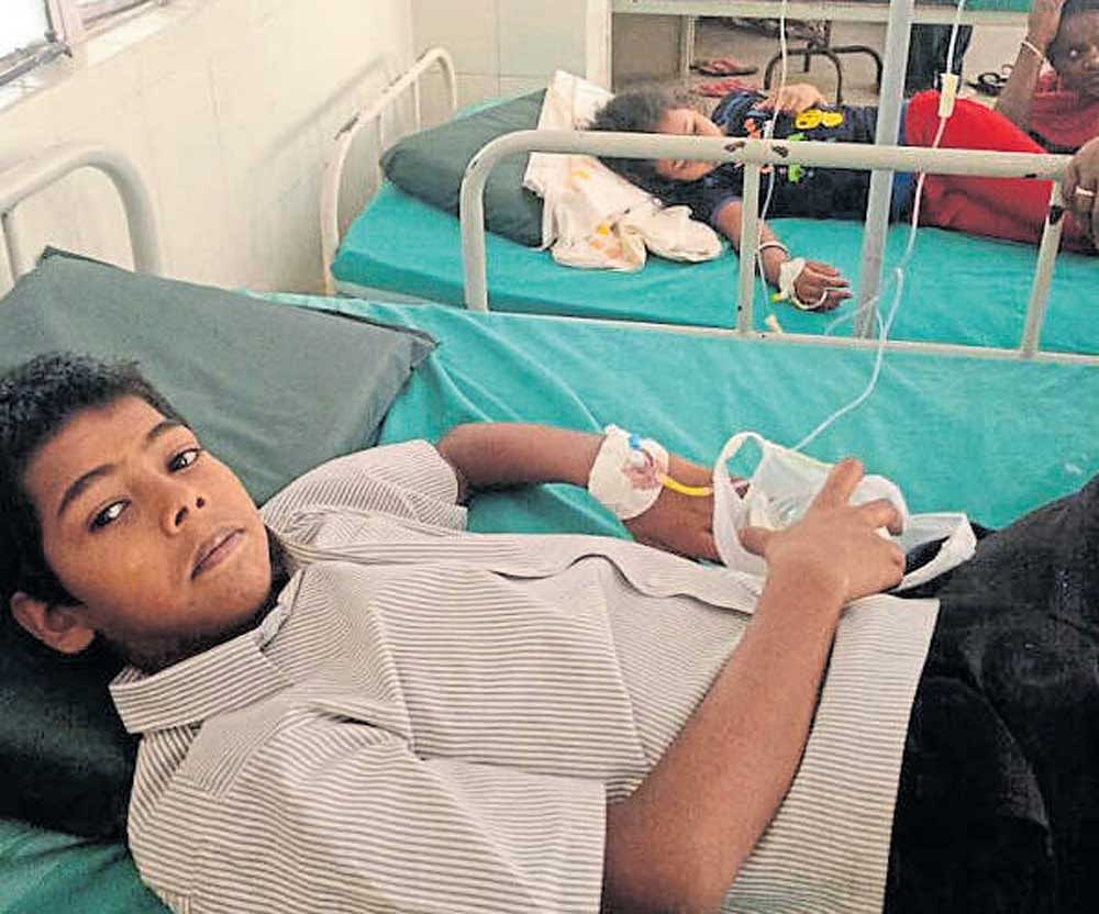 Children, who were admitted for food poisoning undergo treatment at K C General Hospital, on Wednesday. DH photo