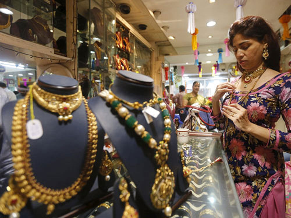 The occasion of Akshaya Tritiya usually sees people buying gold en masse, due to belief that purchasing the metal during this day brings prosperity. Photo credit: PTI