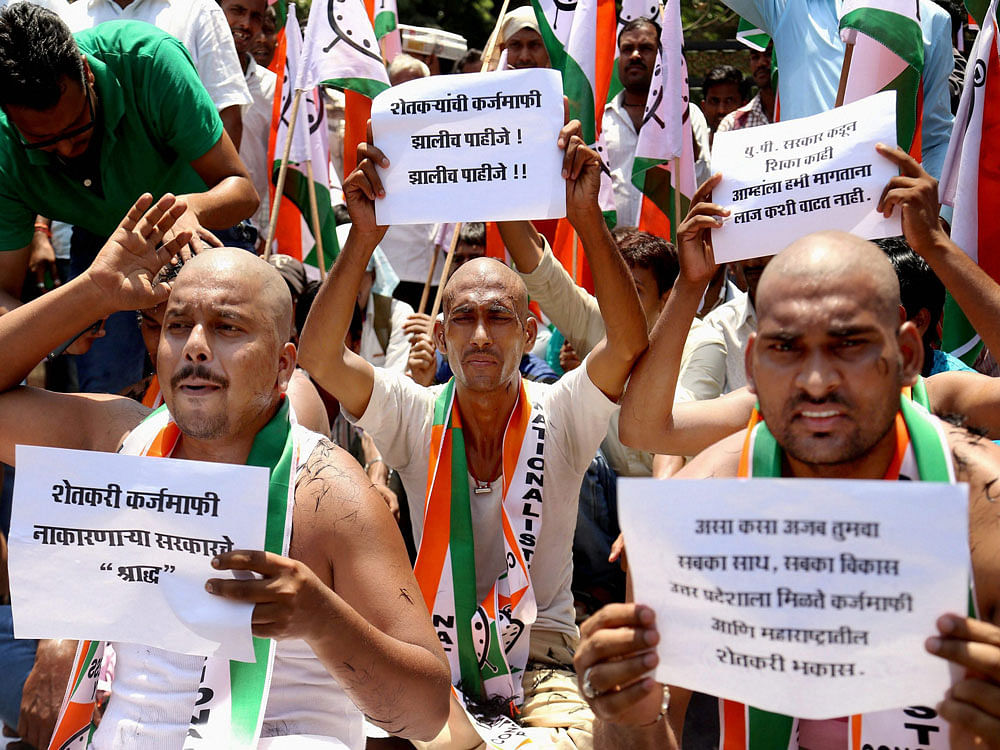 The protests by farmers from many states, most notably TN, for waiver of farm loans among other reasons, has created a debate about the viability of taxing agricultural income. Photo credit: PTI.