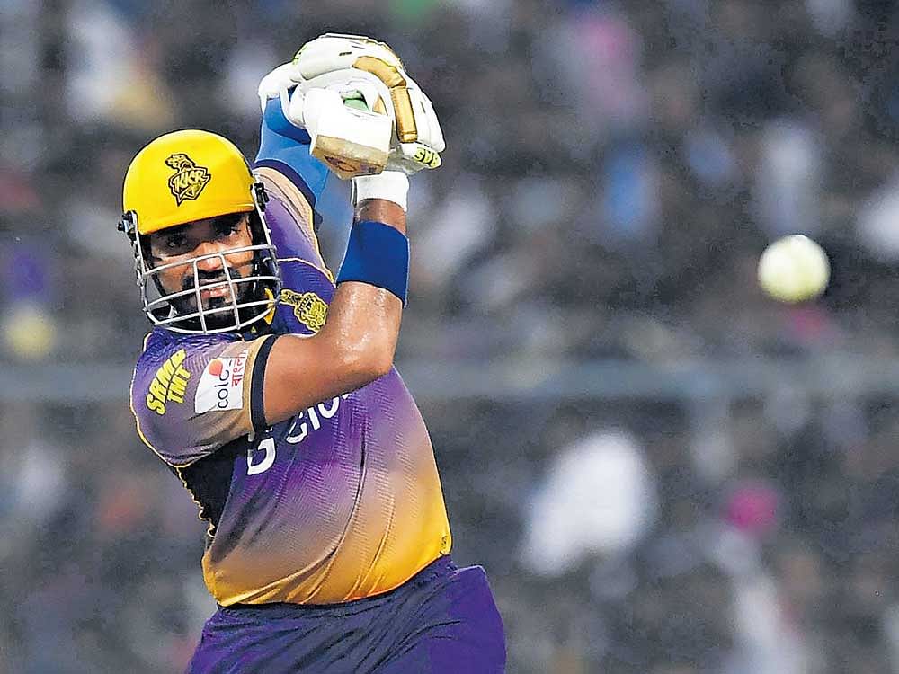 STYLISH: Kolkata Knight Riders' Robin Uthappa slams one to the fence en route to his 59 against Delhi Daredevils. AFP