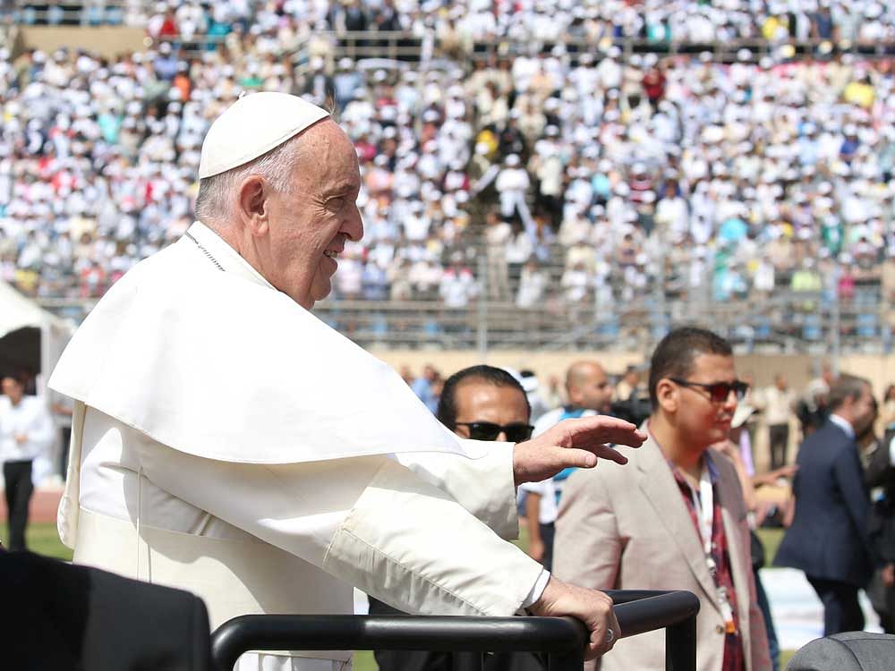 Pope Francis arrives to lead a mass in Cairo, Egypt. Reuters Photo