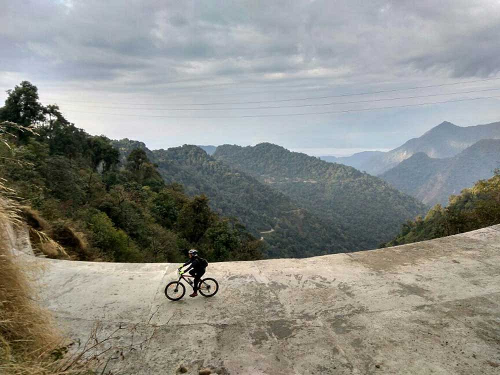 Exertion: To cycle around Arunachal also means viewing splendid landscapes.