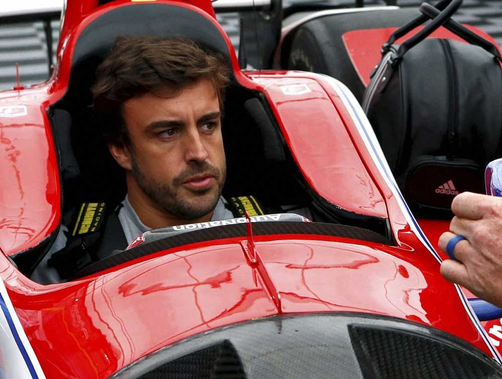 Ambitious: Two-time Formula One champion Fernando Alonso desires to win the Triple Crown of the greatest races -- Monaco Grand Prix, Indianapolis 500 and Le Mans. AP/PTI