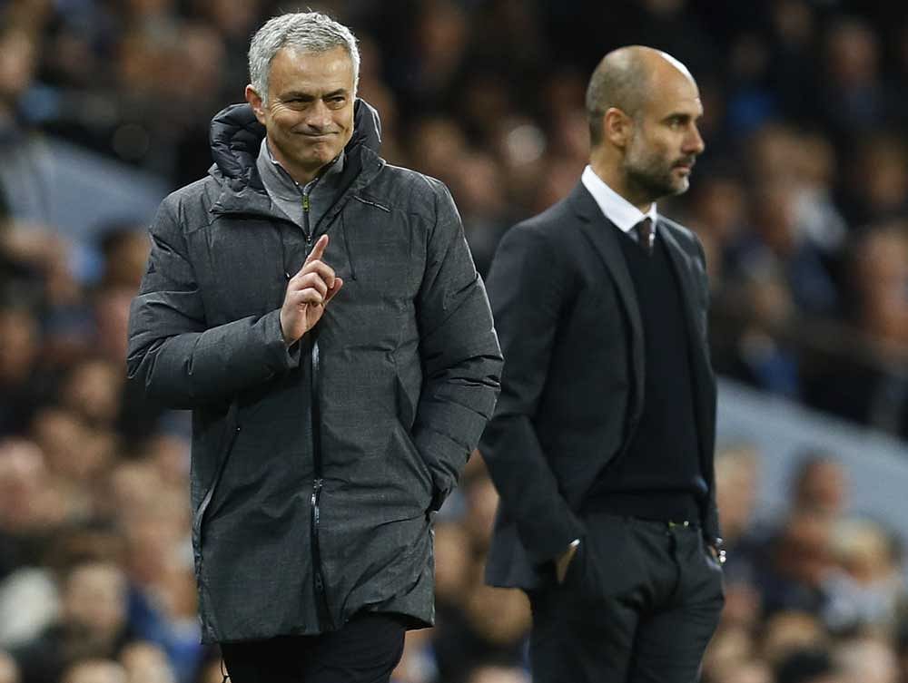 Tough start: Manchester United's Jose Mourinho (left) and Manchester City's Pep Guardiola will have to make some intelliigent purchases this summer. Reuters