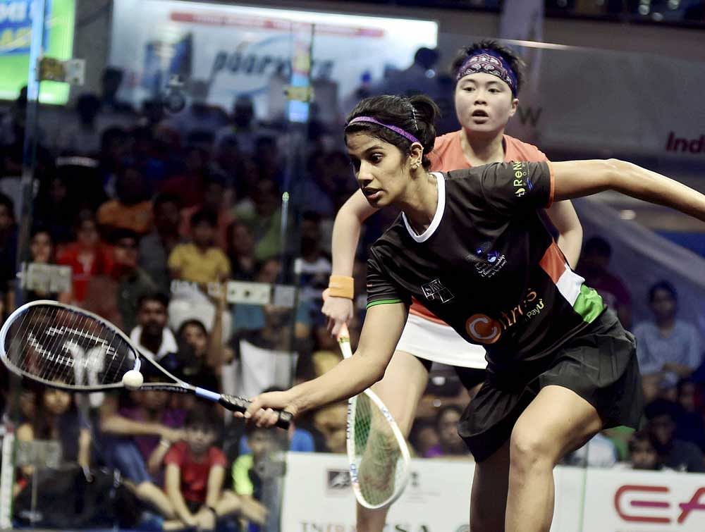 On song: India's Joshna Chinappa (front) en route to her semifinal win over Hong Kong's Tong Tz Wing in Chennai on Saturday. Joshna won 11-6, 11-4, 11-8. PTI