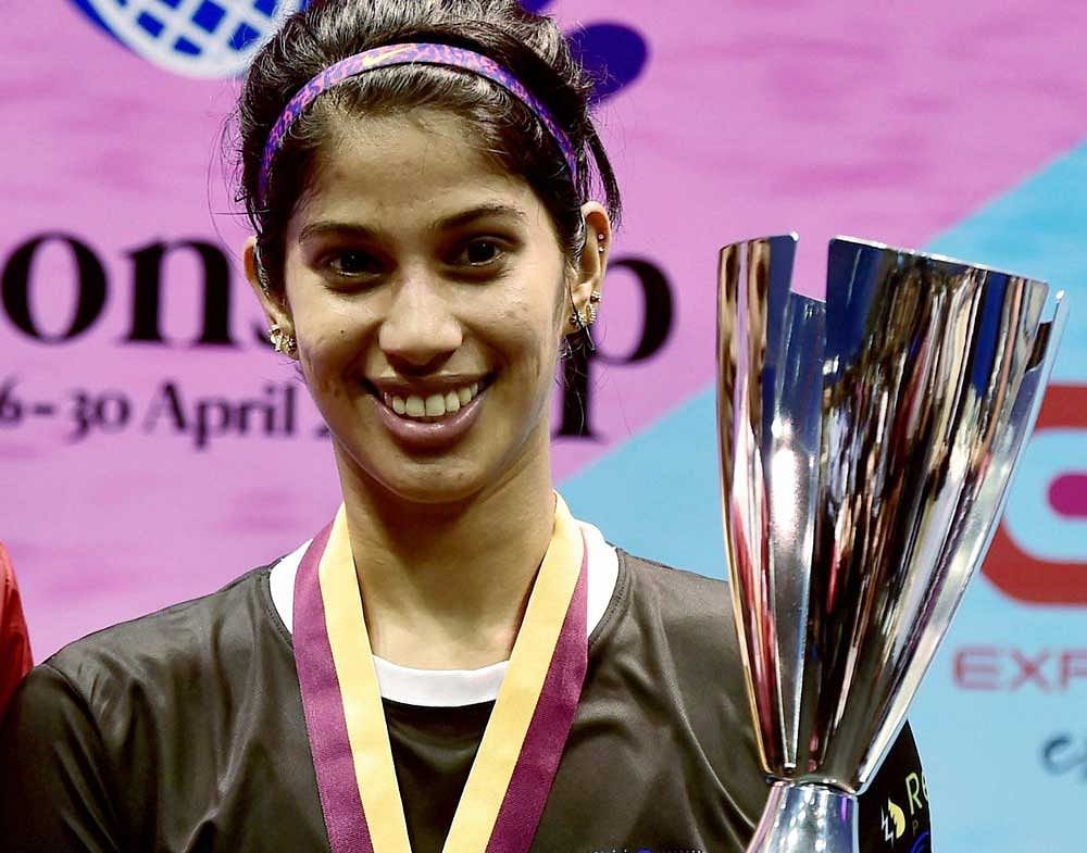 Triumphant: Joshna Chinappa with the trophy after winning Asian squash championship in Chennai on Sunday. Joshna overcame Dipika Pallikal Karthik in the final. PTI