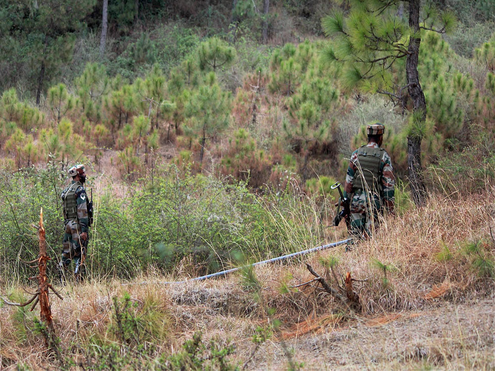 Soldiers monitoring the Line of Control after an unprovoked attack by the Pakistani army killed 2 jawans. Intelligence reports now indicate that 55 terror camps are currently operating in PoK, across the LoC. Photo credit: PTI