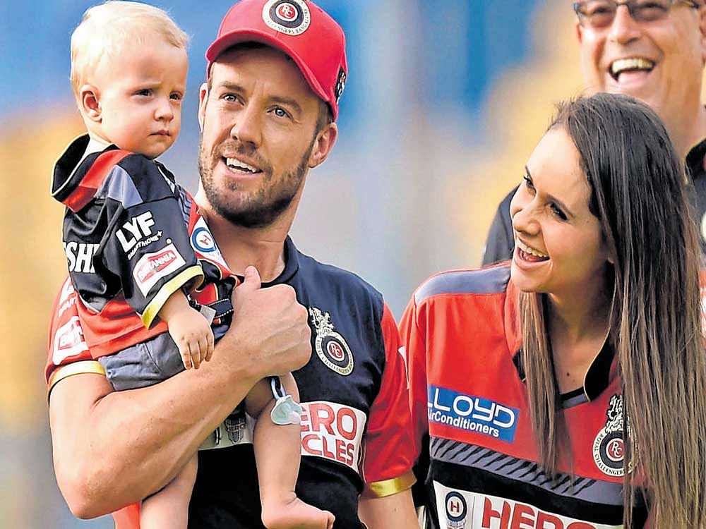 strong bond Wife Danielle Swart and son Abraham were constant travelling companions for A B de Villiers during the early part of IPL-10. DH file photo/SRIKANTA SHARMA R