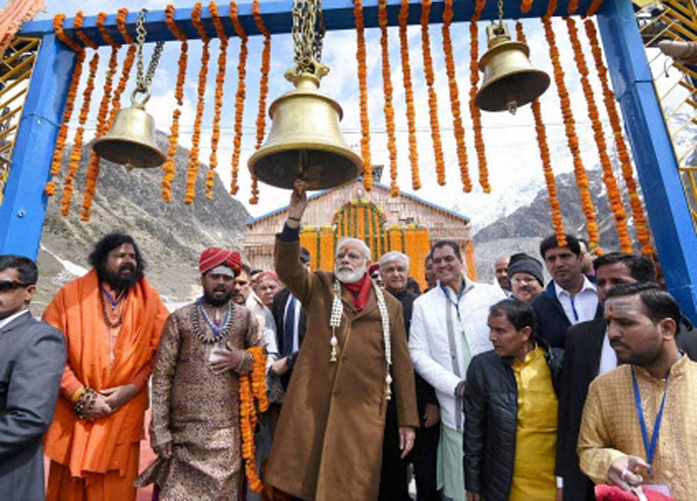 Prime Minister Narendra Modi during his visit to the Kedarnath Temple, in Uttarakhand on Wednesday. Governor of Uttarakhand, Krishan Kant Paul is also seen. PTI Photo