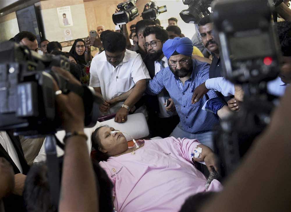 Egyptian patient Eman Ahmed, who almost spent two months undergoing weight-reduction procedure at Saifee Hospital, is being shifted to Burjeel Hospital in Abu Dhabi, where doctors will continue her rehabilitation and weight-reduction treatment, in Mumbai on Thursday. PTI Photo