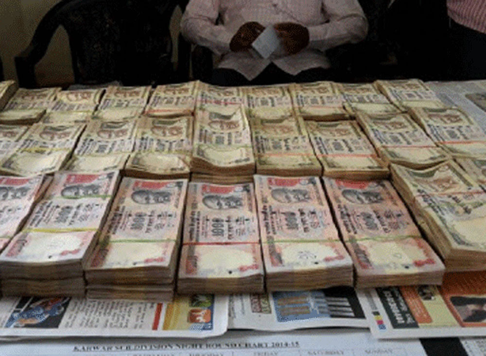 Over 70 lacs in demonetised notes was recovered from a trip in Indore. file photo.