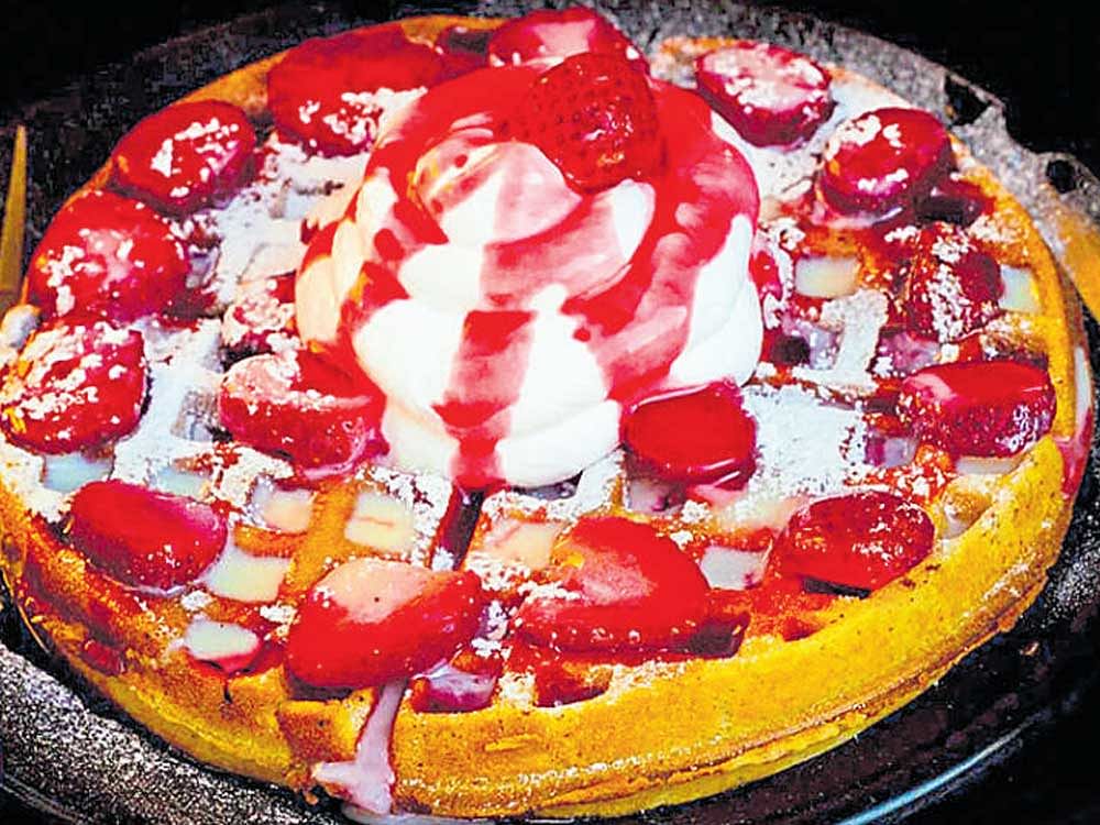 'Fresh strawberry waffles' and (below) 'kheema pav bhaji'.