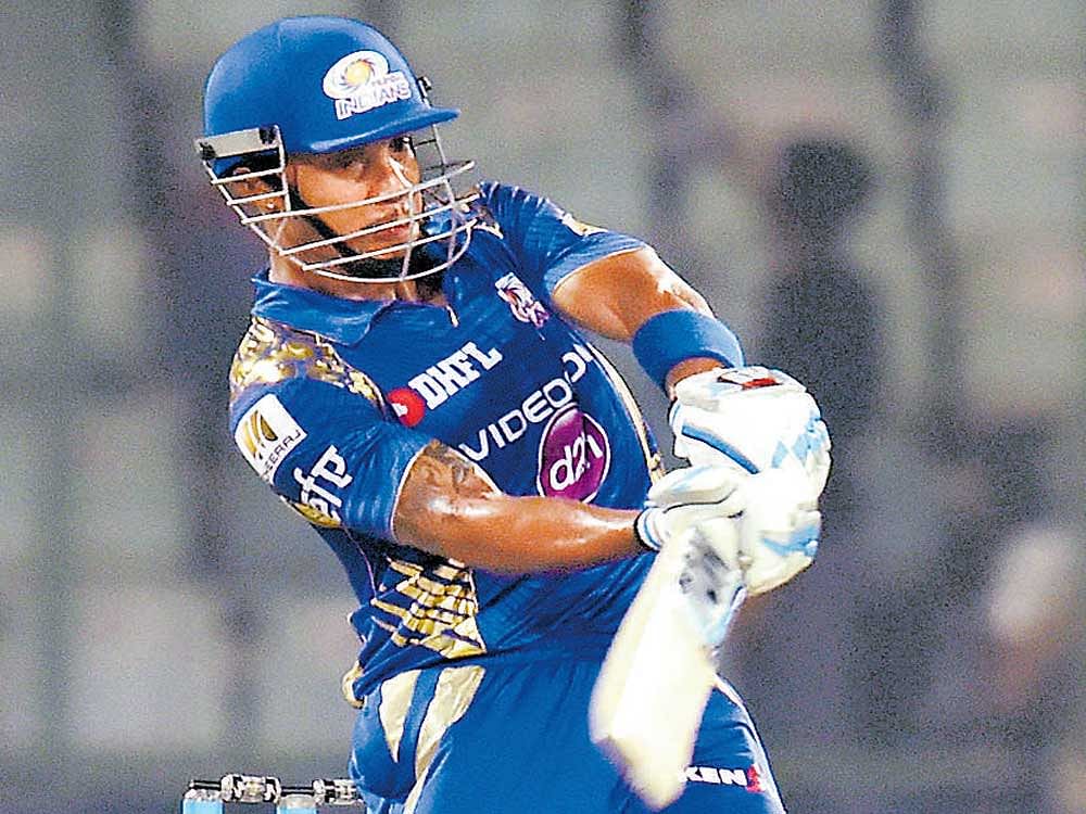 Mumbai Indians' Lendl Simmons pulls one to the boundary during his 43-ball 66 on Saturday. pti