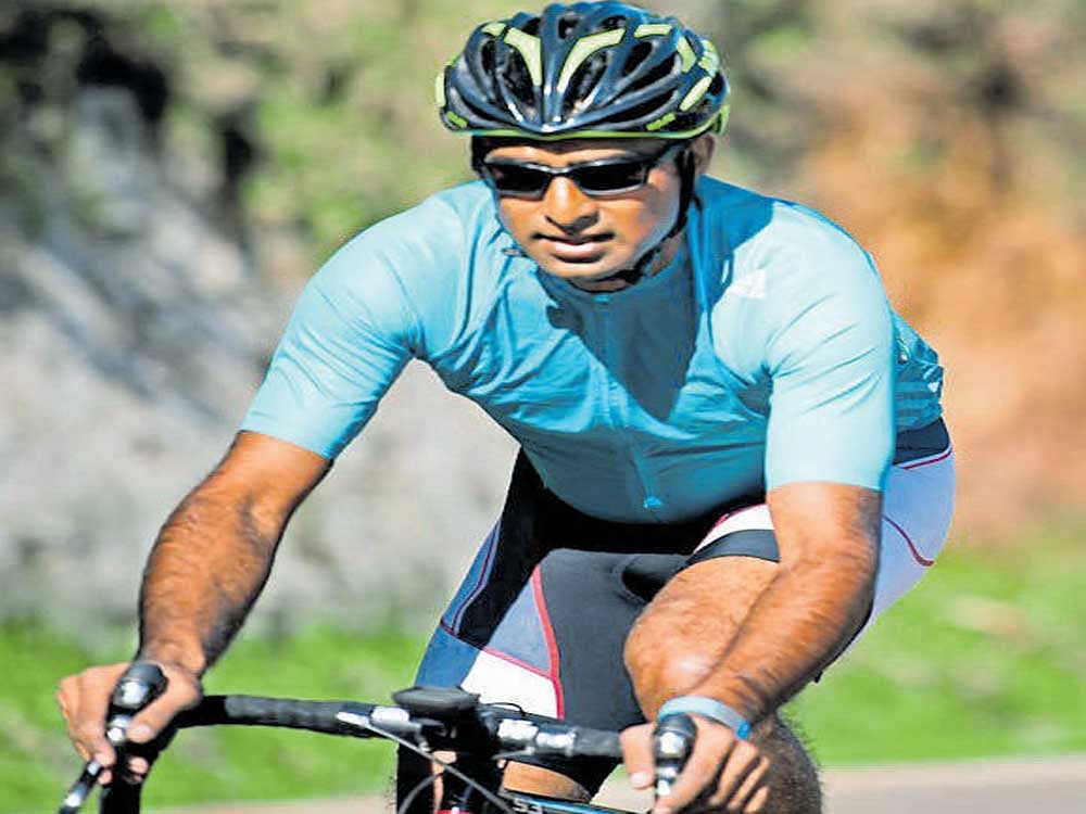 Cyclists, like Nikhil Ram Mohan (above), feel that apart from keeping fit, cycling helps them beat the city's growing traffic and save fuel expenses.