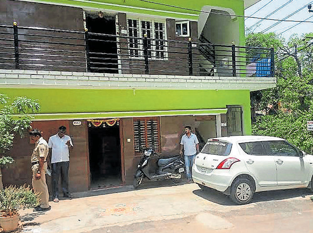 The house in Kengeri Satellite Town, where a skeleton was recovered from a cemented cupboard on Sunday.  dh photo
