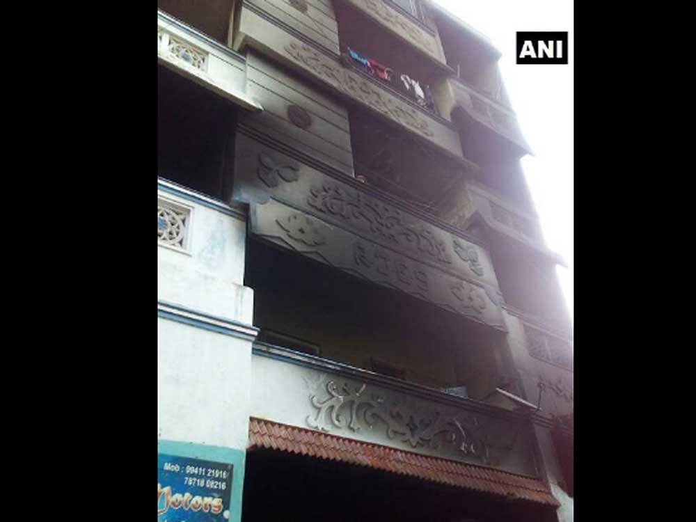 Police sources said that fire broke out at about 4 am at the ground floor of the building. Thick fumes entered the houses and the victims were suffocated while they were sleeping. Picture courtesy ANI