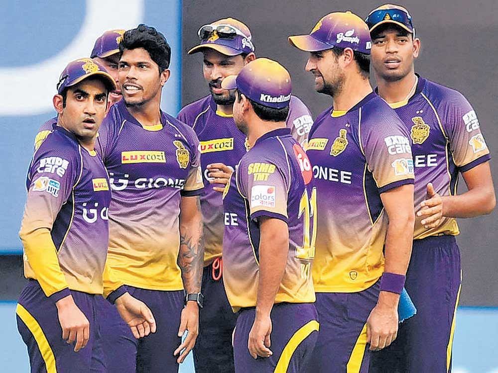 on a roll Kolkata Knight Riders, with their place in the play-offs assured, take on Kings XI Punjab in Tuesday's clash. afp