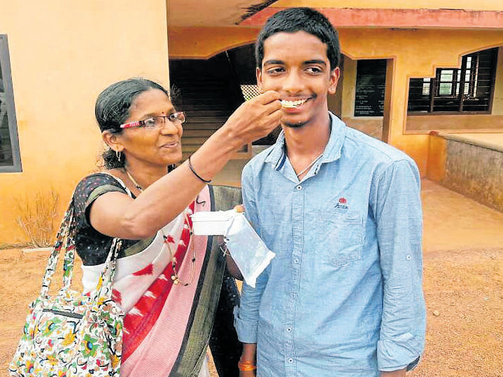 Poornanand with his mother Savitha
