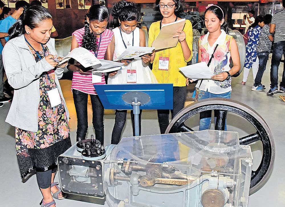 Children take notes about an exhibit at the Visvesvaraya Industrial and Technological Museum on Thursday. dh photo