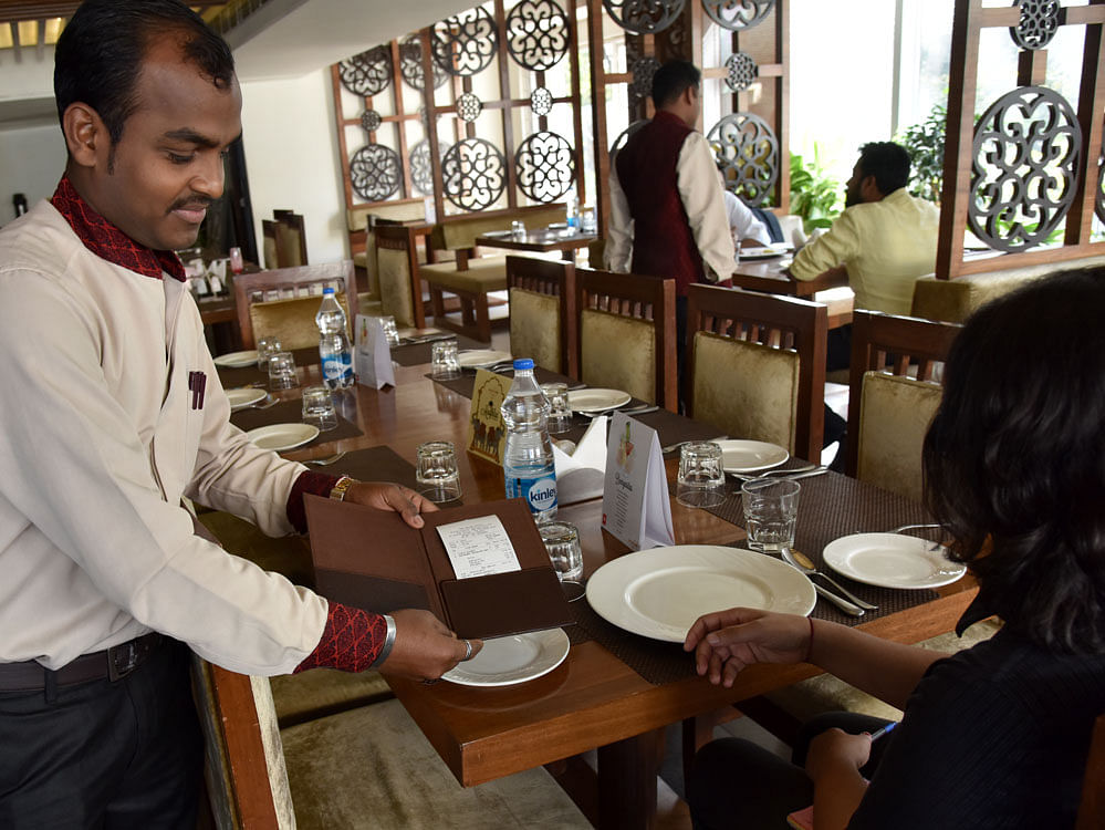 Karnataka currently levies only a 4% VAT on non-AC restaurants and no service tax. Under GST regime, all non-AC restaurants will be taxed at 12% after all the local levies are subsumed under one tax. DH File Photo