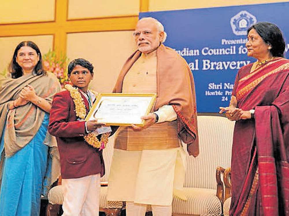 A file picture shows Nilesh receiving the National bravery award from Prime Minister Narendra Modi in January 2016.