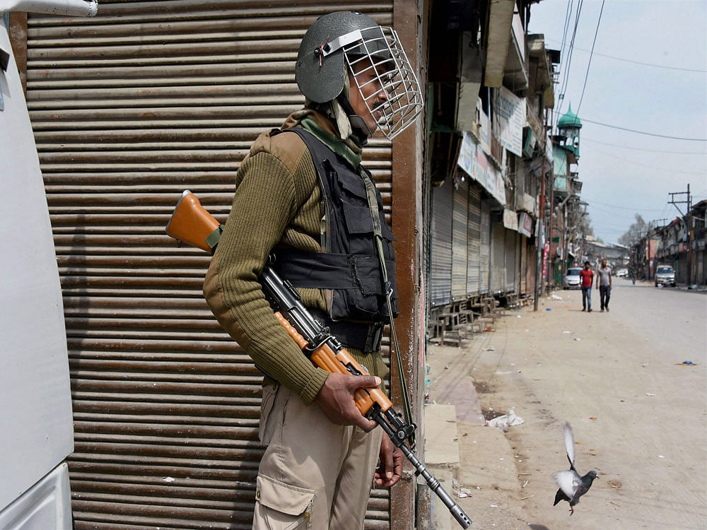 Hundreds of policemen and paramilitary personnel were seen patrolling the lanes and by-lanes of Srinagar. PTI File Photo