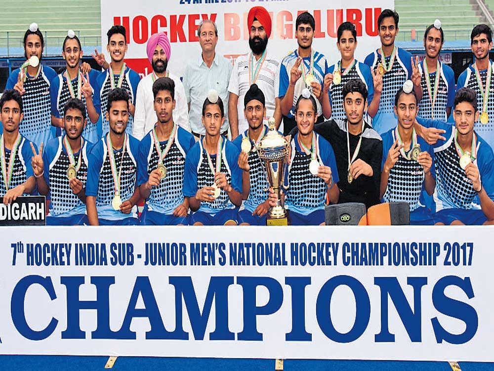 Hockey Chandigarh team, champions of the 7th HI Sub-junior men's national championship (A Division) on Sunday. From Left (Standing): Maninder Singh, Sahibjeet Singh, Vishal Rana, Sukhwinder Singh (manager), Roelant Oltmans (Indian hockey team chief coach), Gurminder Singh (coach), Harpinder Singh, Sanjay, Manraj Singh Marok, Sukhman Singh, Mandeep. (Sitting): Amandeep, Hardeep Singh, Hashim, Yashdeep Goyal, Arshdeep Singh, Sukhjeet Singh, Jaspreet Singh, Ravi Kumar, Diljeet Singh, Mohit. DH photo