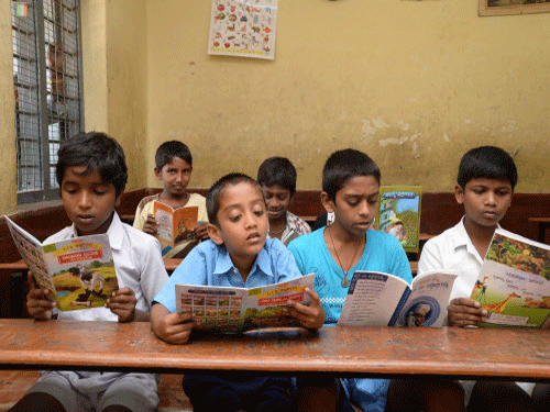 According to the reports, the district education authorities had got new books and satchels distributed among the children on getting information that chief minister Yogi Adityanath might pay a visit to the school during his visit to the district on Saturday. Deccan Herald file photo for representation only