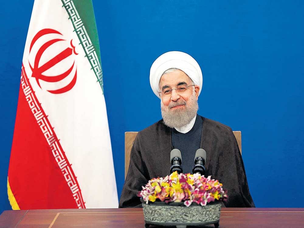 faith restored: Iranian President Hassan Rouhani attends a televised speech after he won the election, in Tehran, Iran. Rouhani says that the message of the election that gave him another four-year term is one of Iran living in peace and friendship with the world. PTI