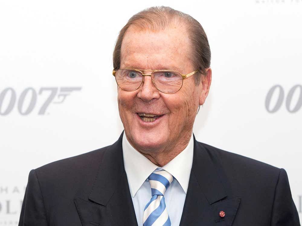 Actor Sir Roger Moore attends the 50 Years of James Bond Auction at Christies in London, October 5, 2012. REUTERS
