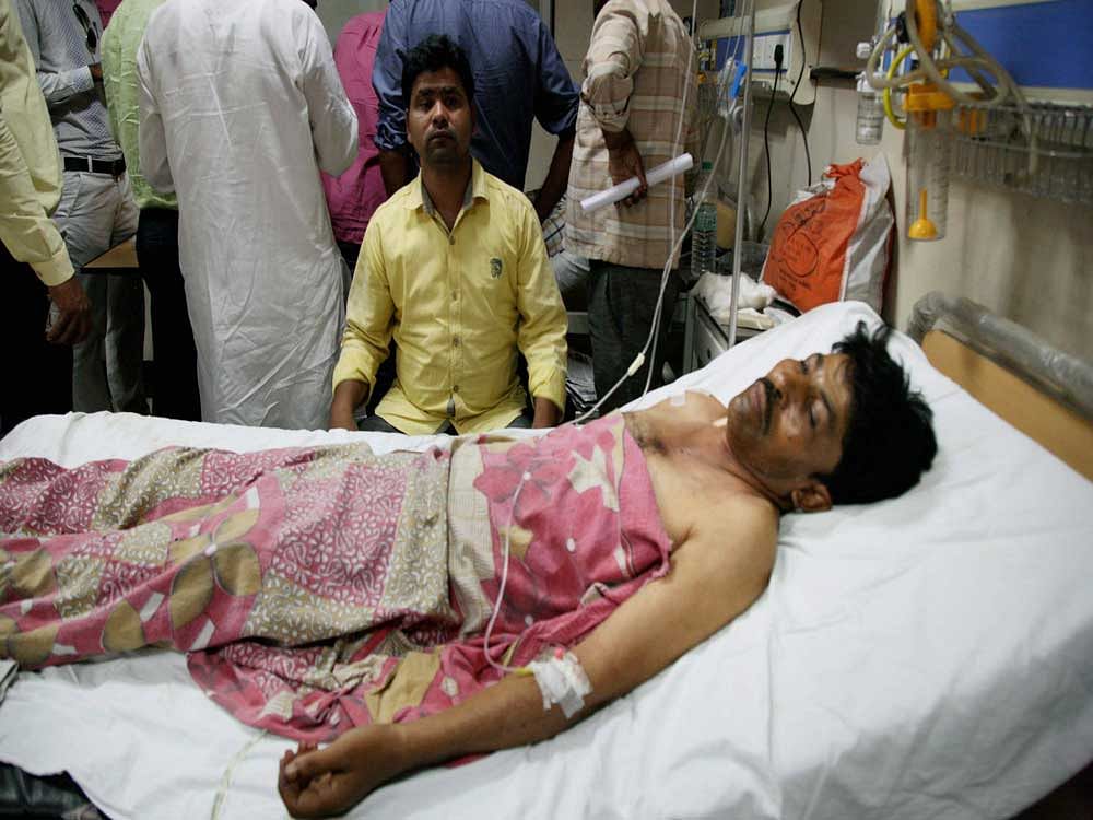 An injured being treated at a hospital in Saharanpur on Wednesday, a day after fresh clashes. PTI Photo