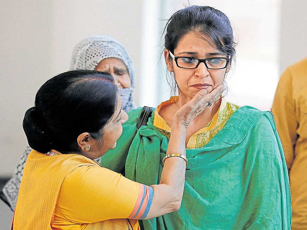 External Affairs Minister Sushma Swaraj consoles Uzma, an Indian woman who was reportedly forced to marry a Pakistani  national, on her arrival in New Delhi on Thursday.Reuters