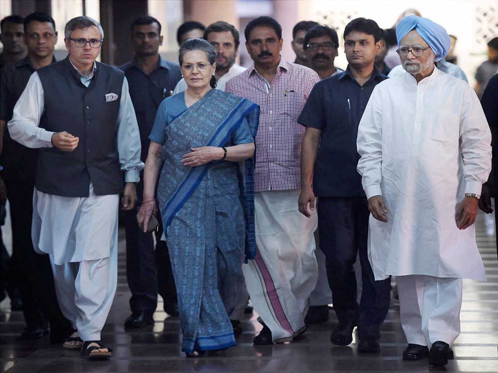 Former prime minister Manmohan Singh with Congress President Sonia Gandhi, party vice president Rahul Gandhi and former Jammu and Kashmir Chief Minister and President, National Conference Omar Abdullah after a meeting to discuss the strategy for the upcoming Presidential elections, in New Delhi on Friday. PTI Photo