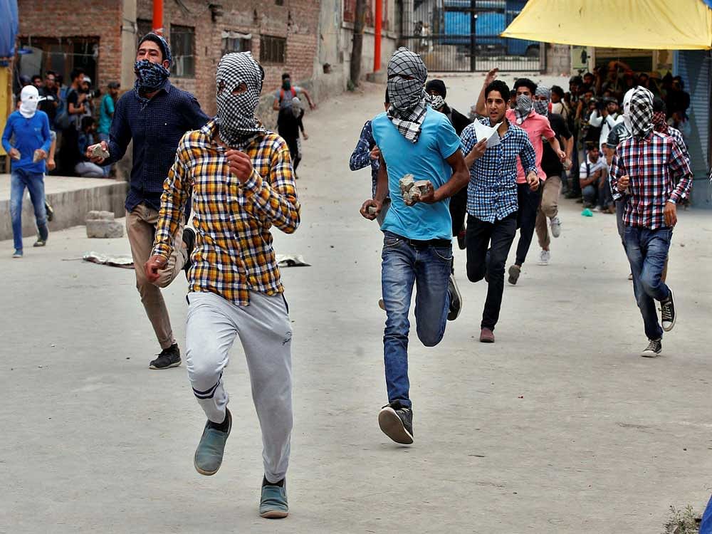 Soon after the killings, stone-pelting protests started at around 50 places. Reuters photo