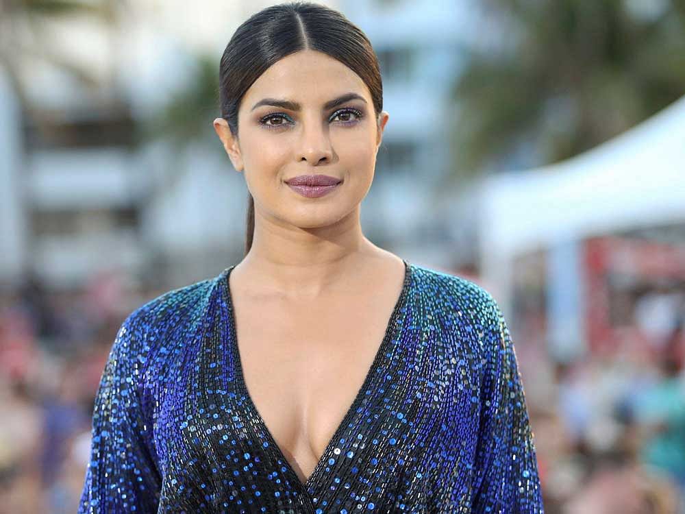 Priyanka Chopra will be the first person to be honoured in the newly minted category 'Internationally Acclaimed Actress'. Photo credit: PTI/AP.