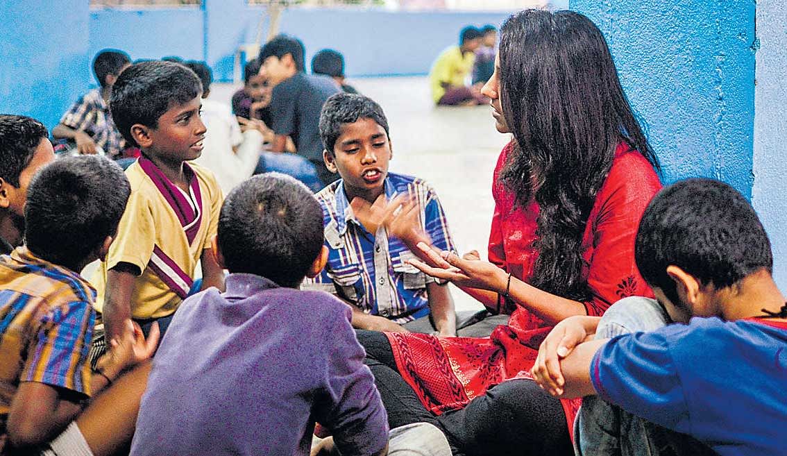 Volunteers of Make A Difference engaged in sessions with children.